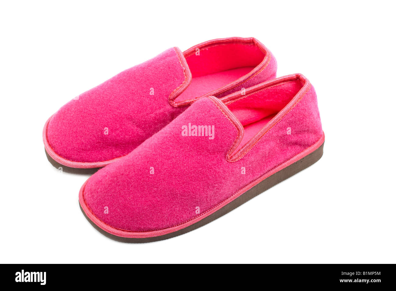 Lady pink slippers with soft shadow on white background Stock Photo