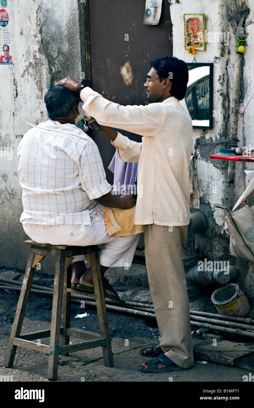 INDIA MUMBAI Barber shop consisting of a chair and mirror along a