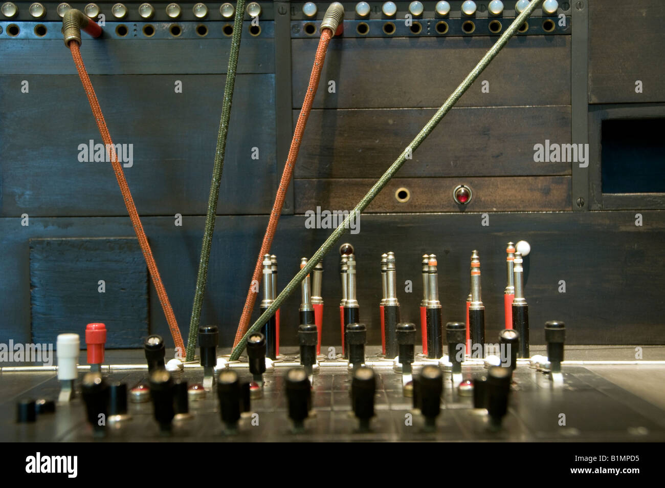 Old telephone switchboard with cables Stock Photo