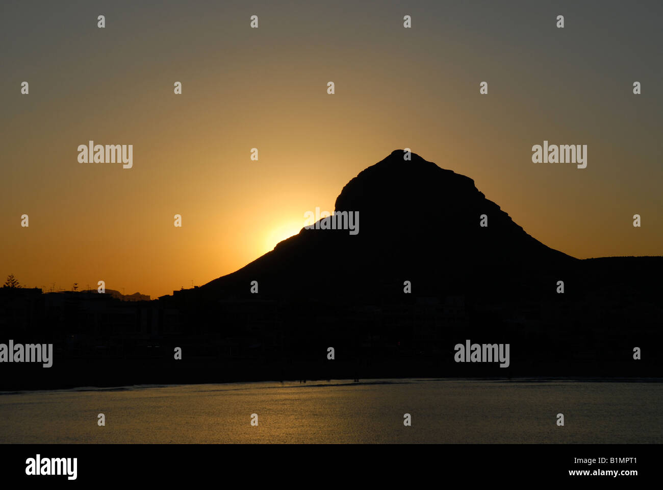 view to Montgo and Arenal beach area at sunset, Javea / Xabia, Alicante Province, Comunidad Valenciana, Spain Stock Photo