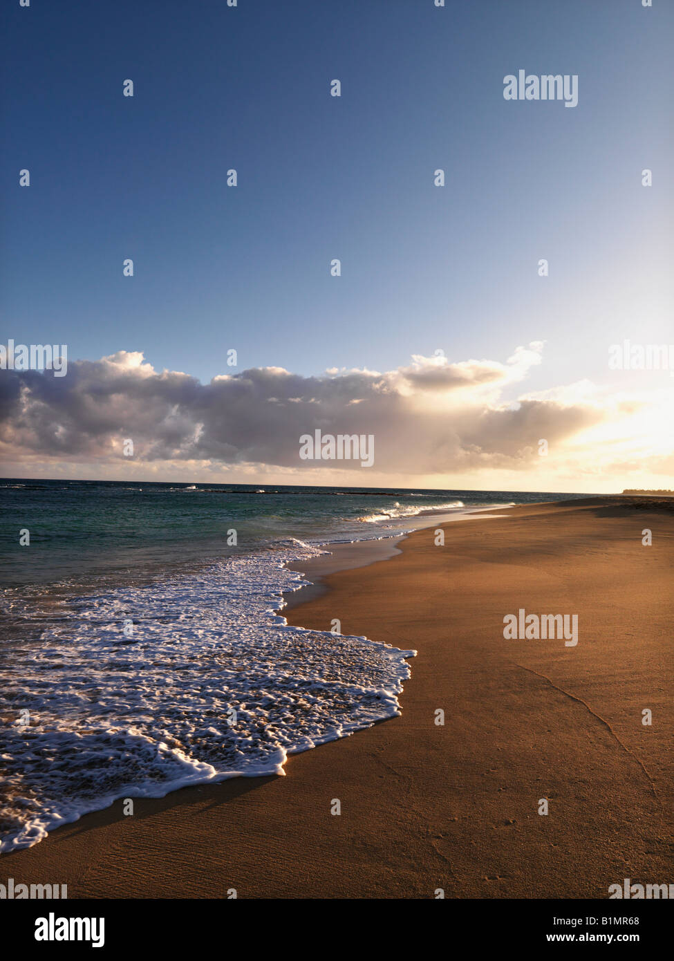The beach at dusk in Maui Hawaii Stock Photo