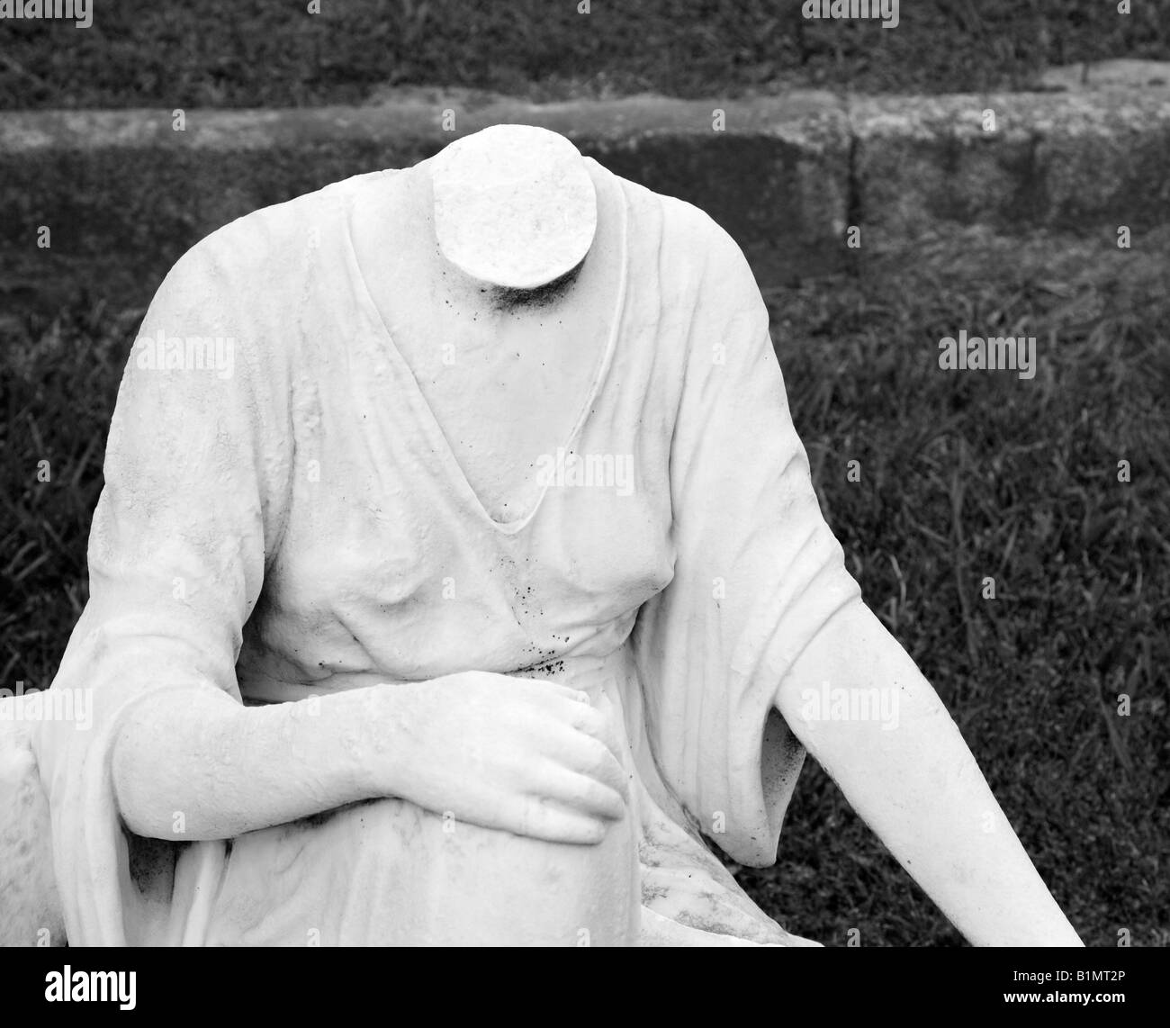 Statue in graveyard of headless woman Stock Photo Alamy