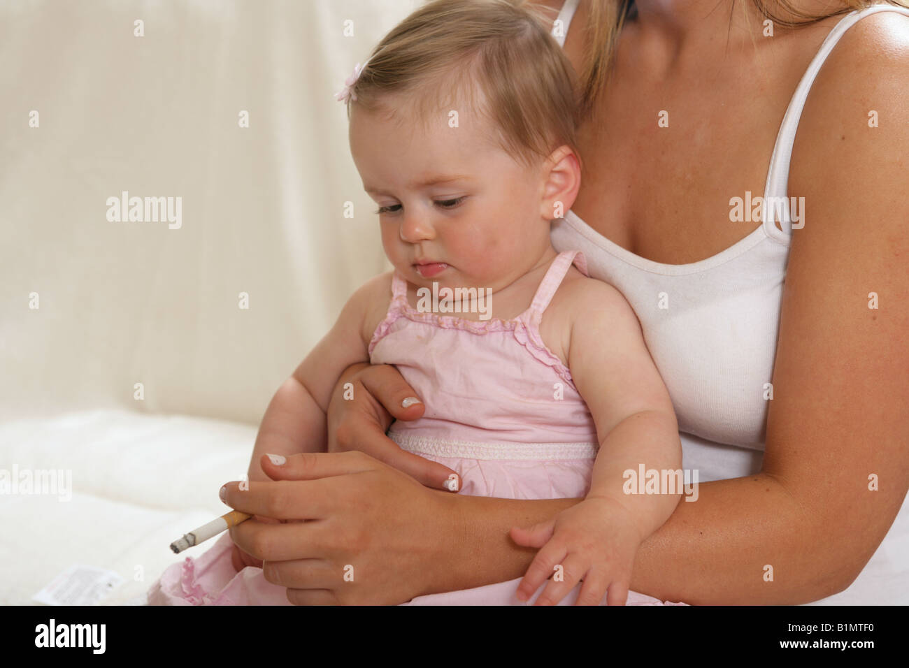 Smoking mum with baby hires stock photography and images Alamy