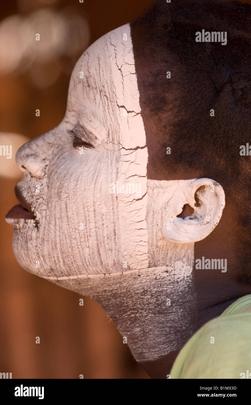 Young Makua woman with white musiro mask. Muxara. Mozambique Stock Photo