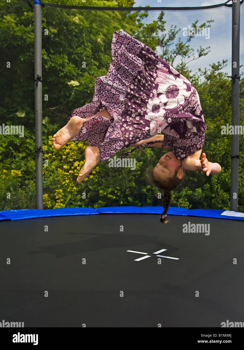Trampolining girl trampoline Cork Ireland somersaulting Stock Photo Alamy