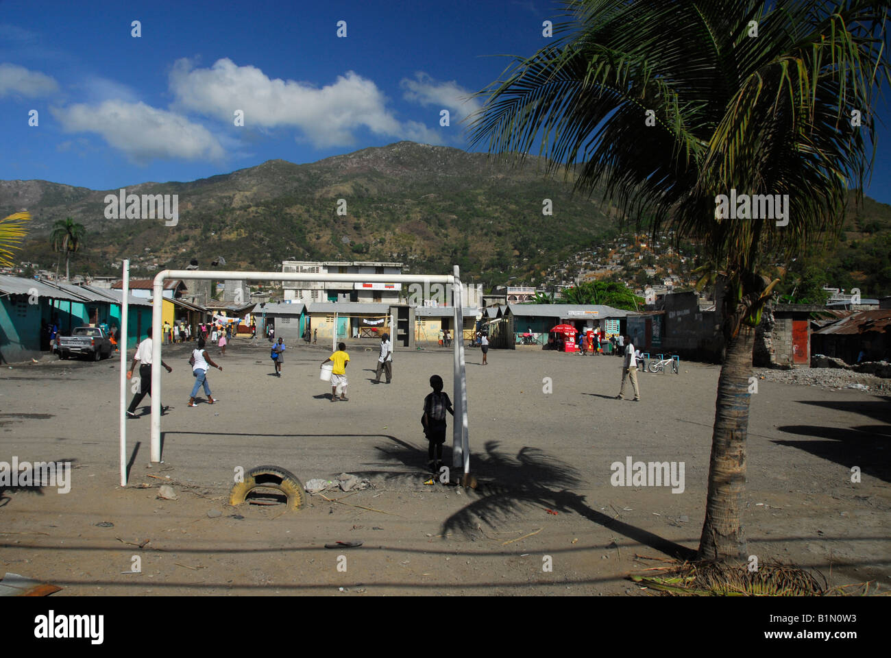 Local people on football field of Cap Haitien, Haiti Stock Photo Alamy