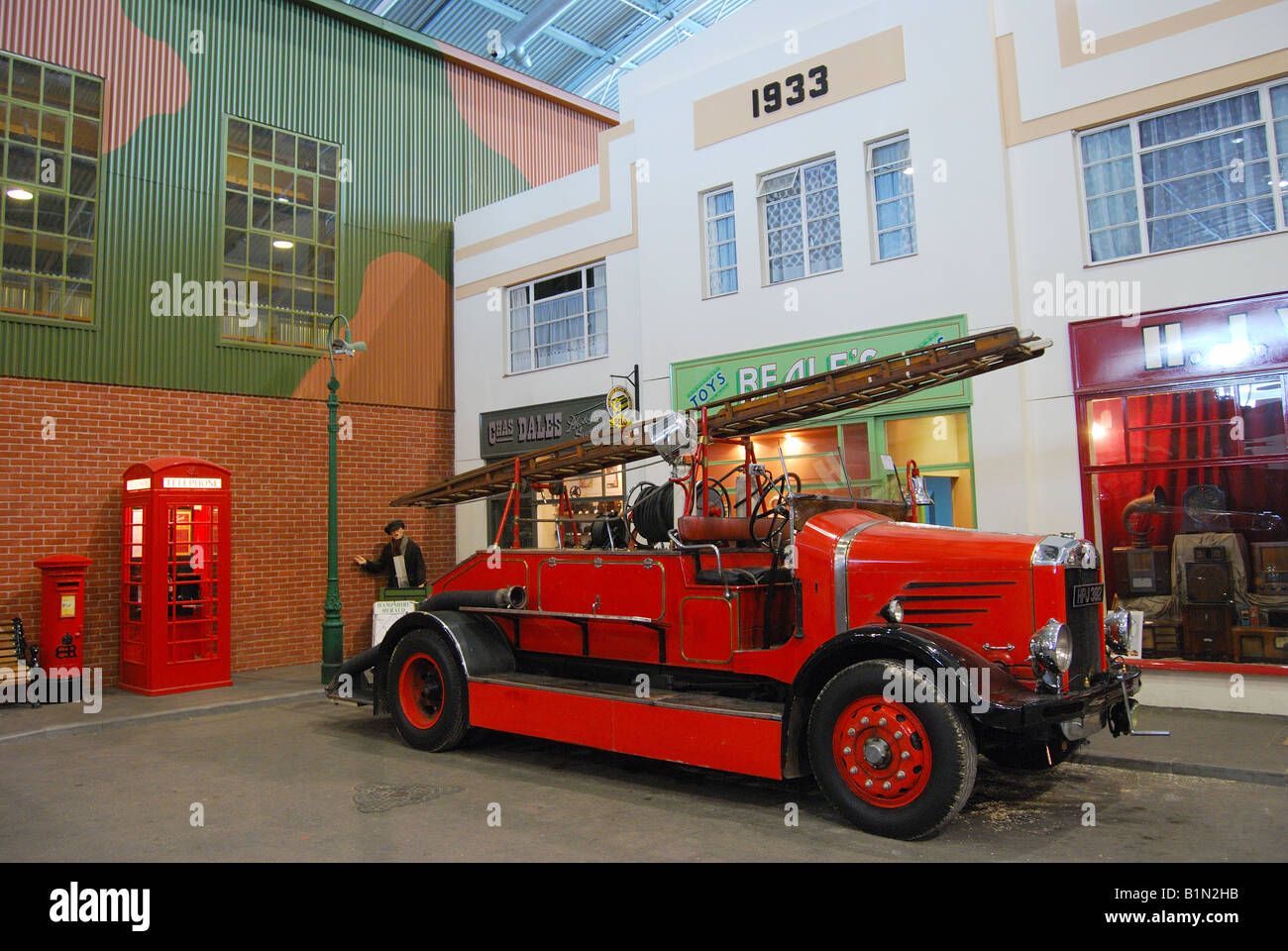 Old fire engine and shops, Milestones Living History Museum, Basingstoke Leisure Park, Basingstoke, Hampshire, United Kingdom Stock Photo