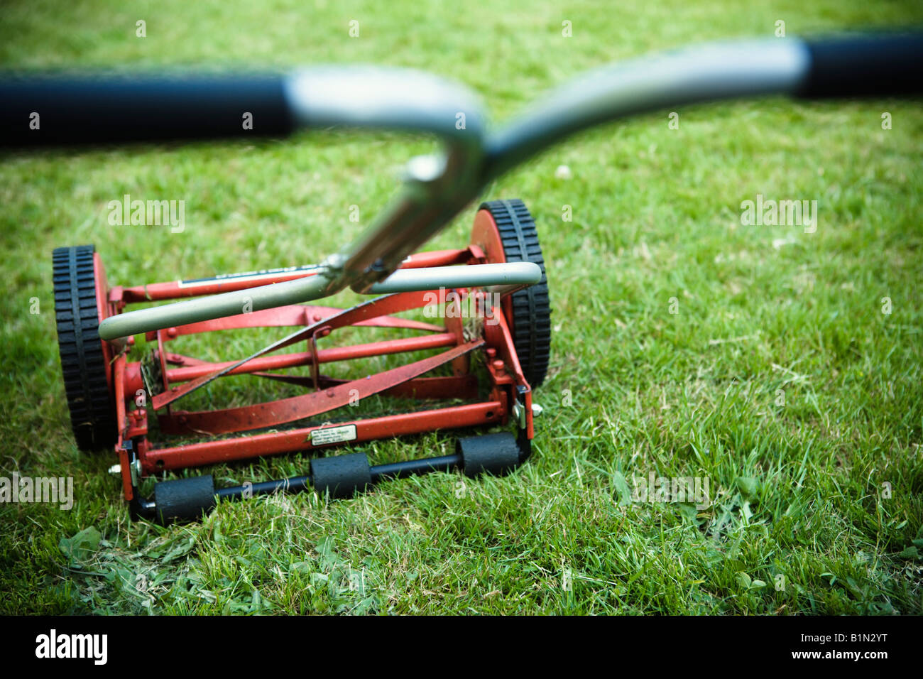 Old fashioned lawn mower hires stock photography and images Alamy