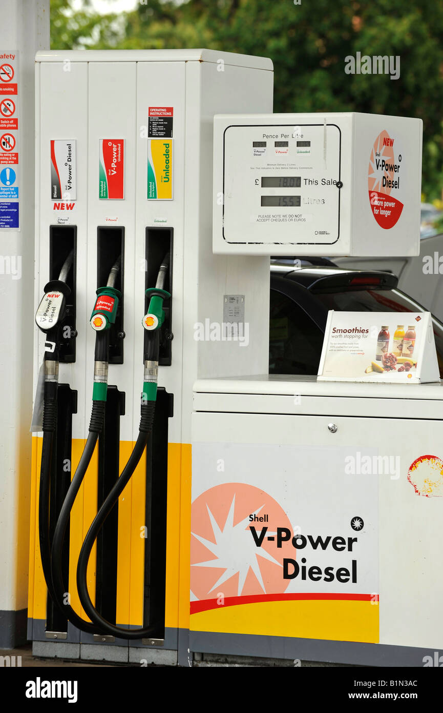 Unleaded petrol and diesel fuel pumps at a Shell filling station Stock Photo