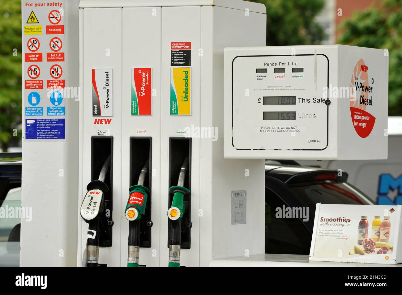 Unleaded petrol and diesel fuel pumps at a Shell filling station Stock Photo