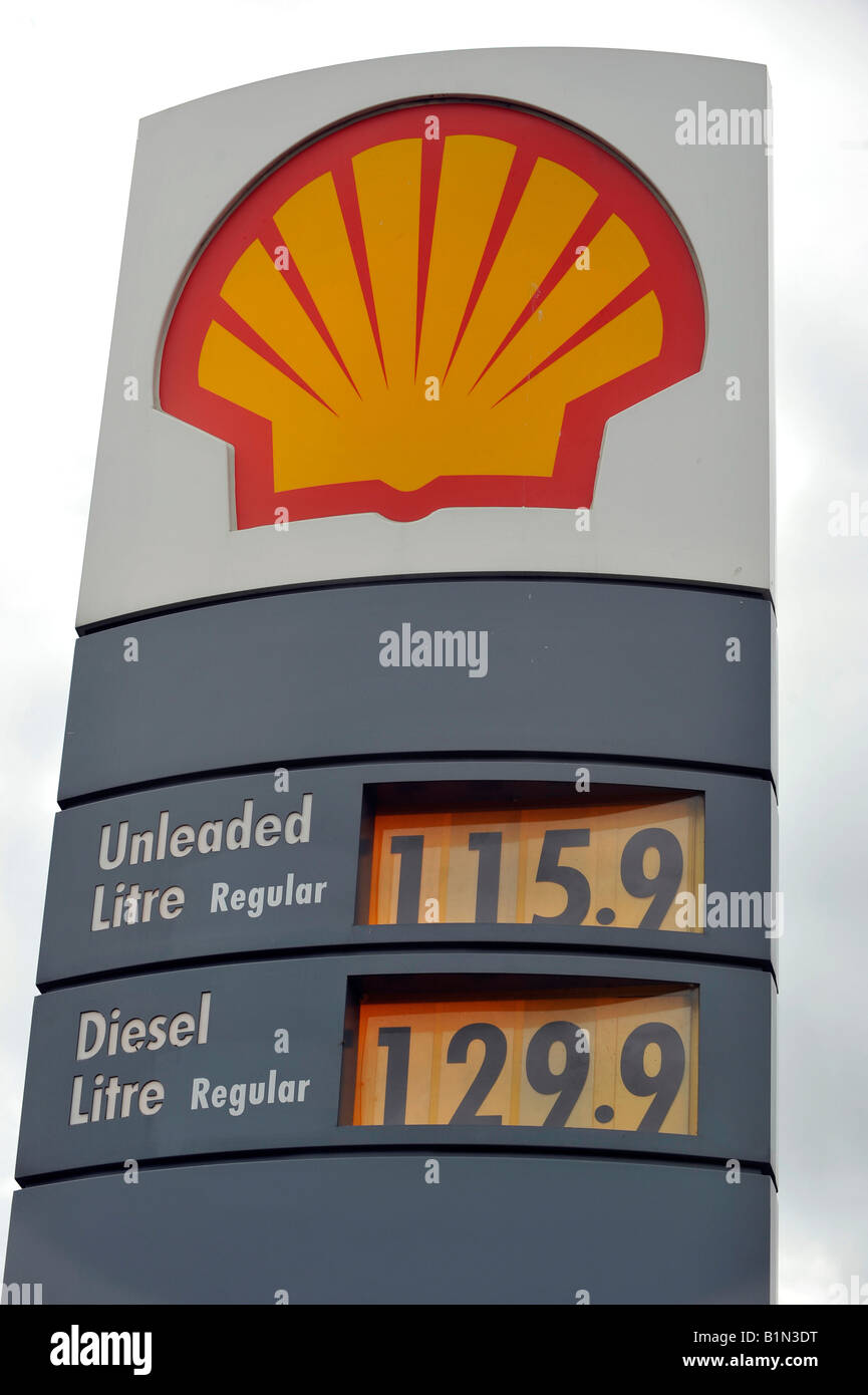 Display board outside a Shell filling station showing unlead petrol and diesel prices per litre in pounds and pence Stock Photo
