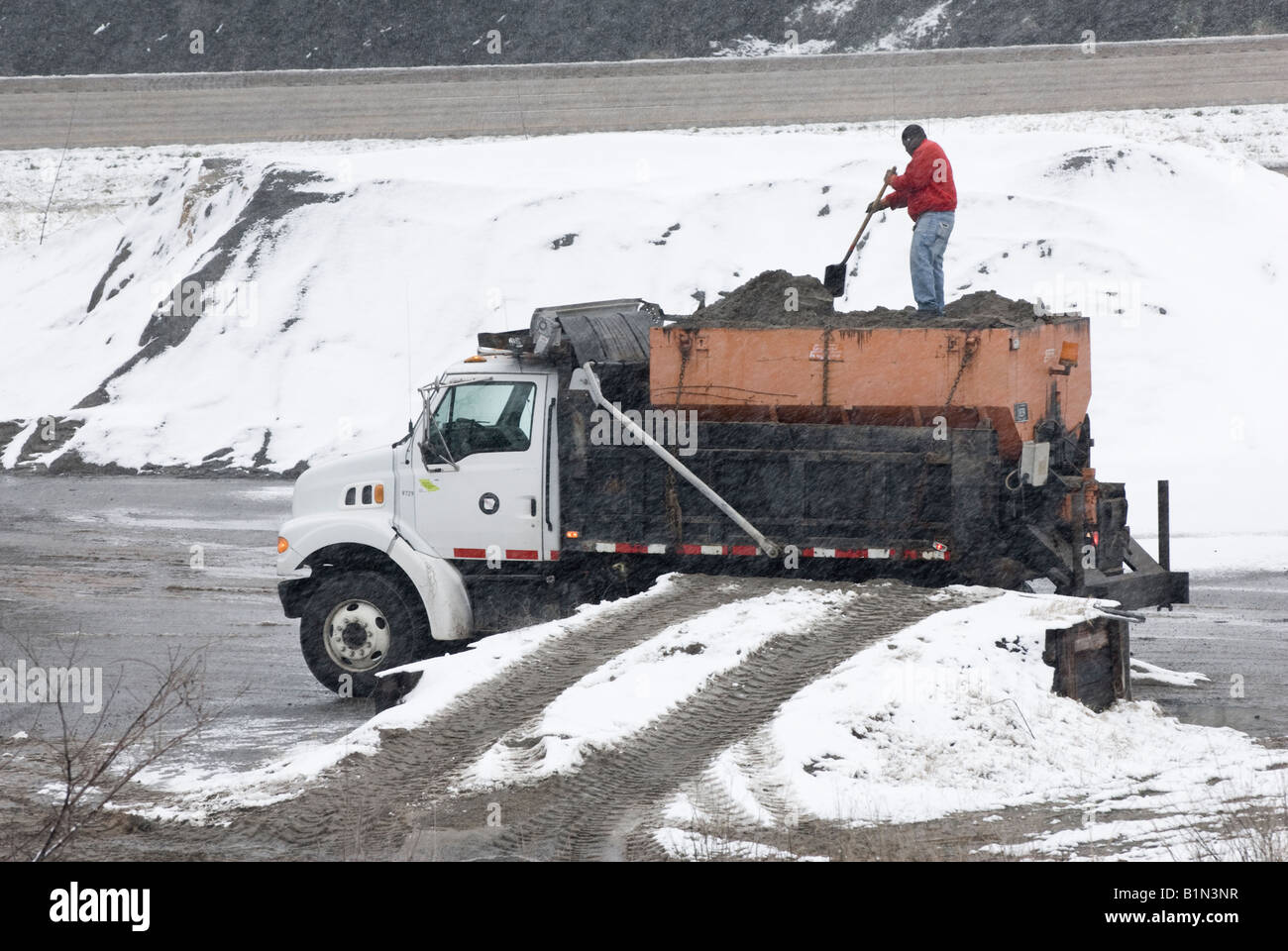 Arkansas Highway And Transportation Department Worker Preparing Sand For Roads During A Snowstorm In Little Rock Arkansas Stock Photo Alamy