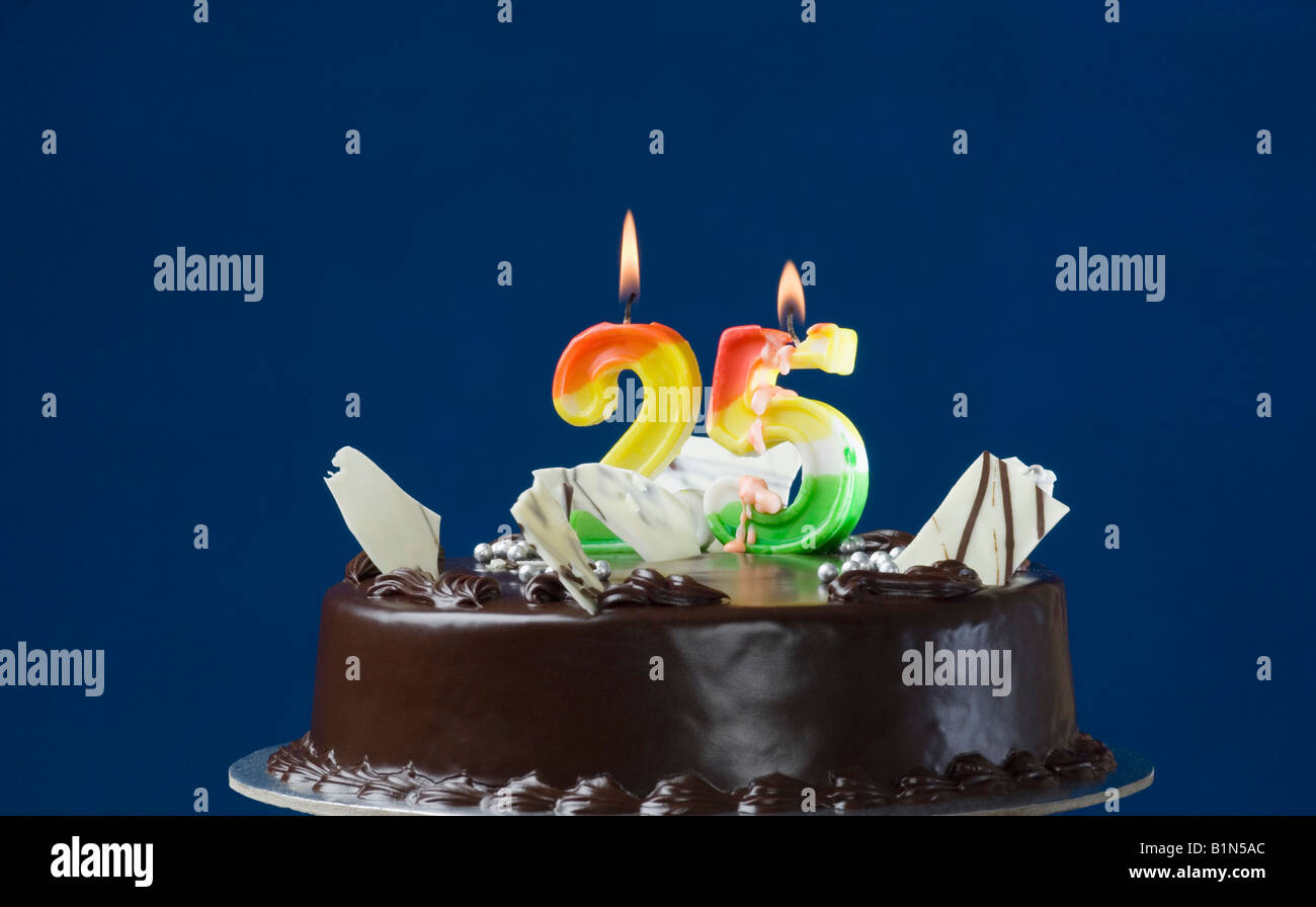 Close-up of lit candles on a birthday cake Stock Photo - Alamy