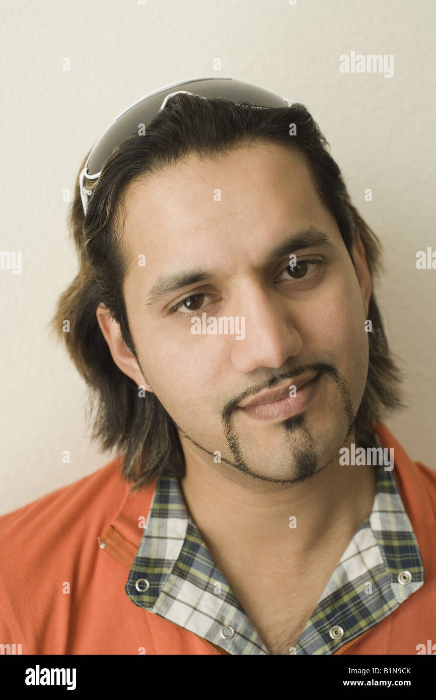 Portrait of a young man smiling Stock Photo - Alamy
