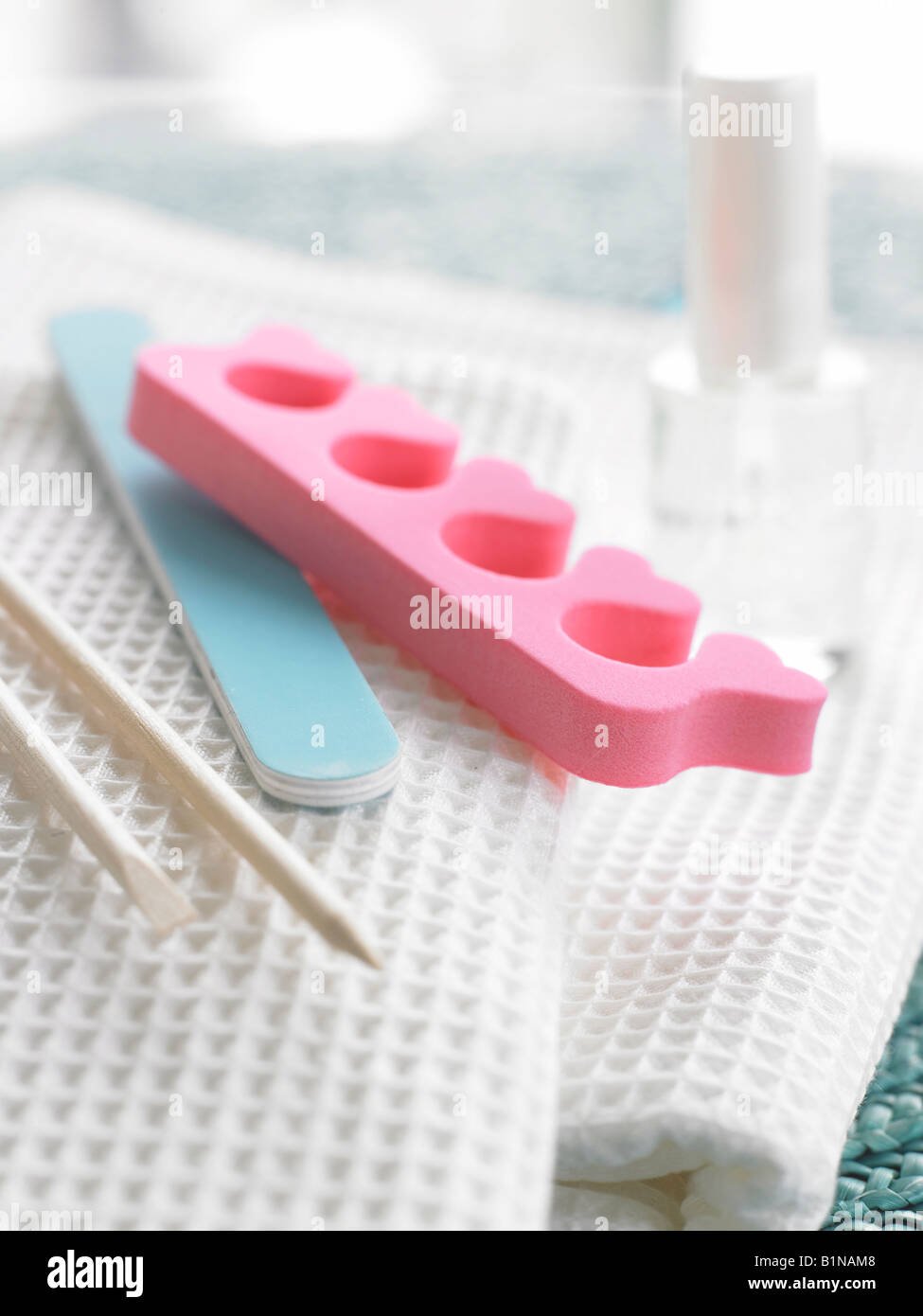 Pedicure set placed on white piqué towels Stock Photo Alamy