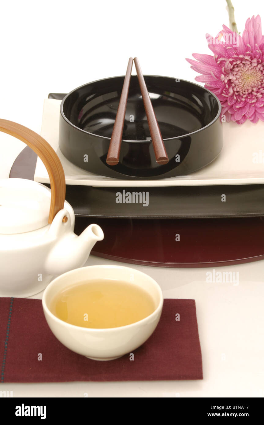 Asian place setting with a teapot and teacup Stock Photo Alamy