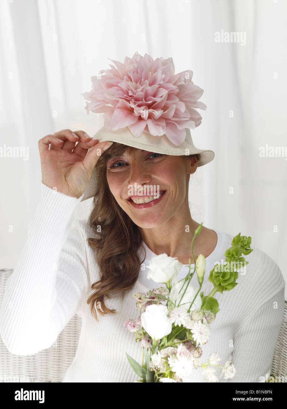Woman wearing pink hat hi-res stock photography and images - Alamy