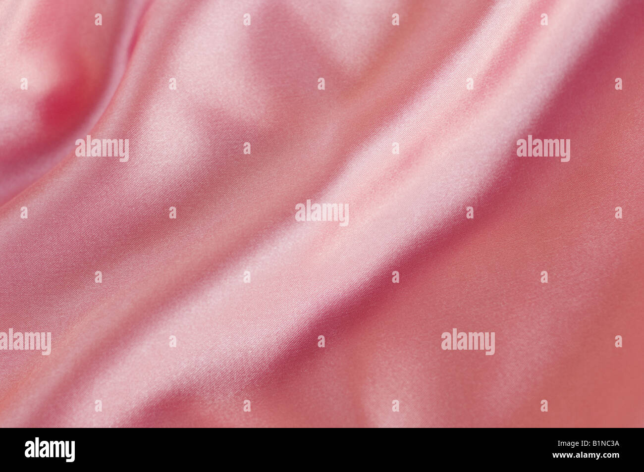 Close-up of crumpled pink satin Stock Photo