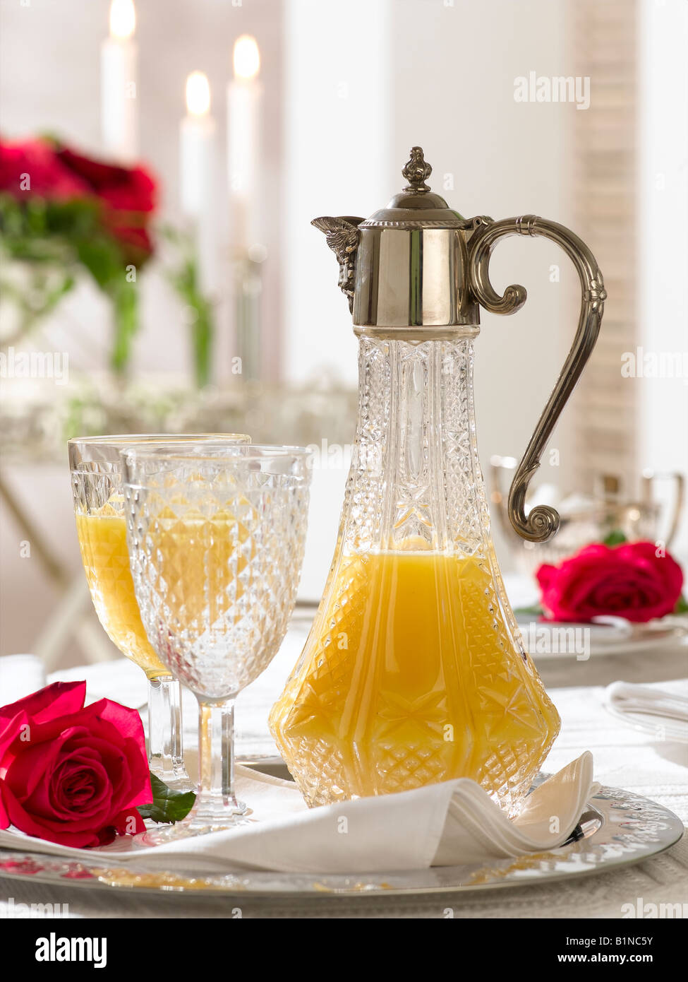 Orange juice in an old carafe Stock Photo Alamy