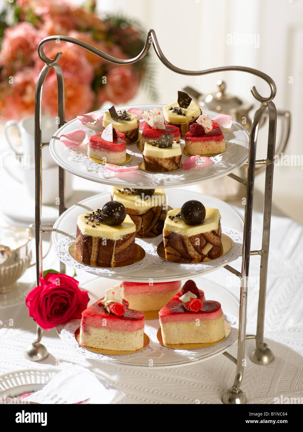 Etagere with tartlets and Petit Fours Stock Photo - Alamy