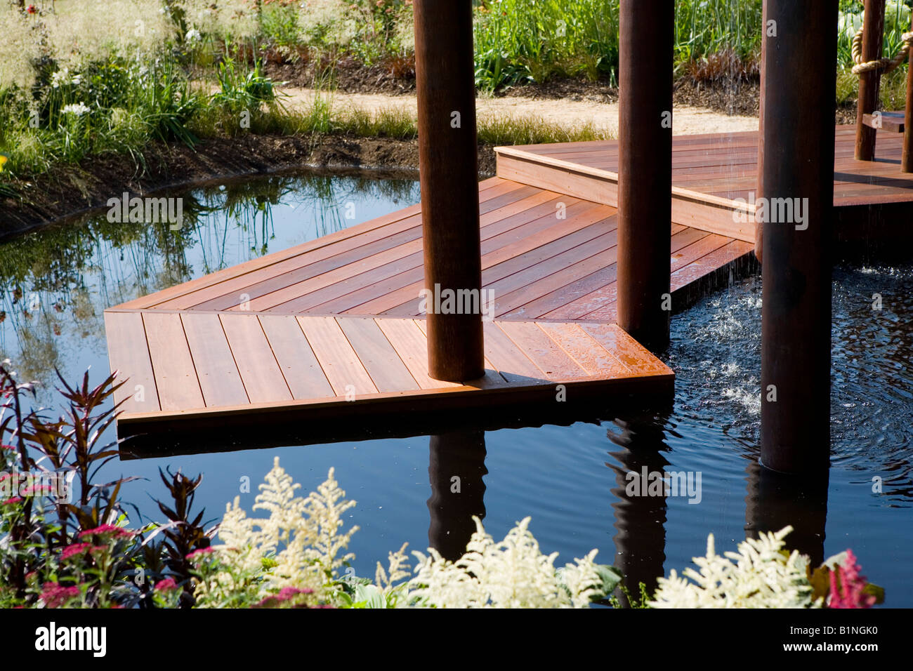 garden pond with decking Stock Photo Alamy