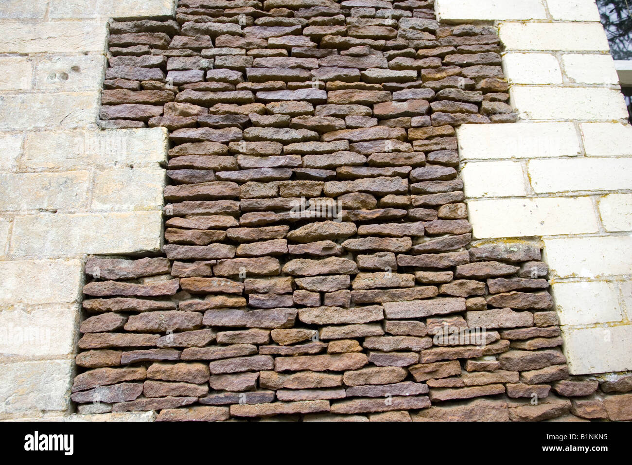 Characteristic brickwork stonework on buildings on Sandringham Estate Norfolk UK Stock Photo