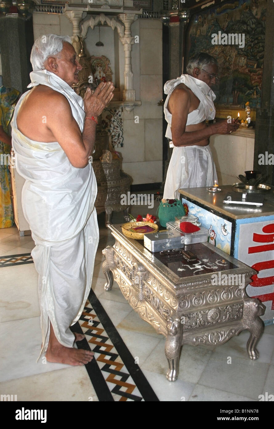 Jain priest praying , Parasvanathaswami Jain Temple , Bangalore , South India Stock Photo
