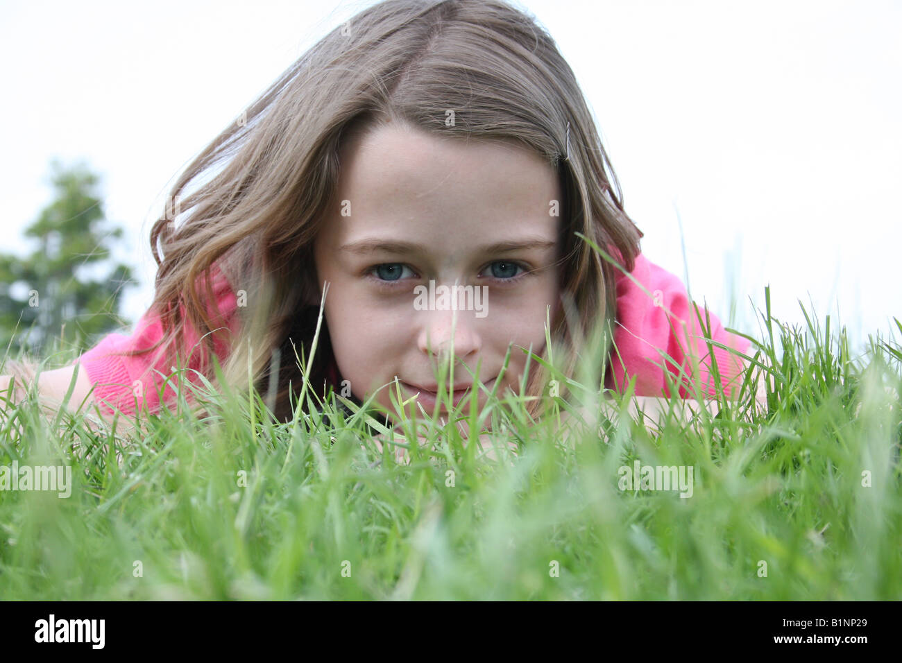 A portrait of a thirteen year old girl in rural England. Stock Photo
