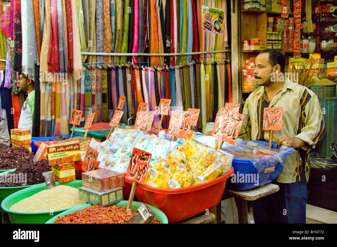An arab shopkeeper waits for customers at the Khan El Khalili market in Cairo Egypt Stock Photo