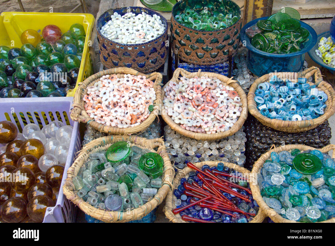 A variety of baskets with beads balls and trinkets for sale at the Khan El Khalili market in Cairo Egypt Stock Photo