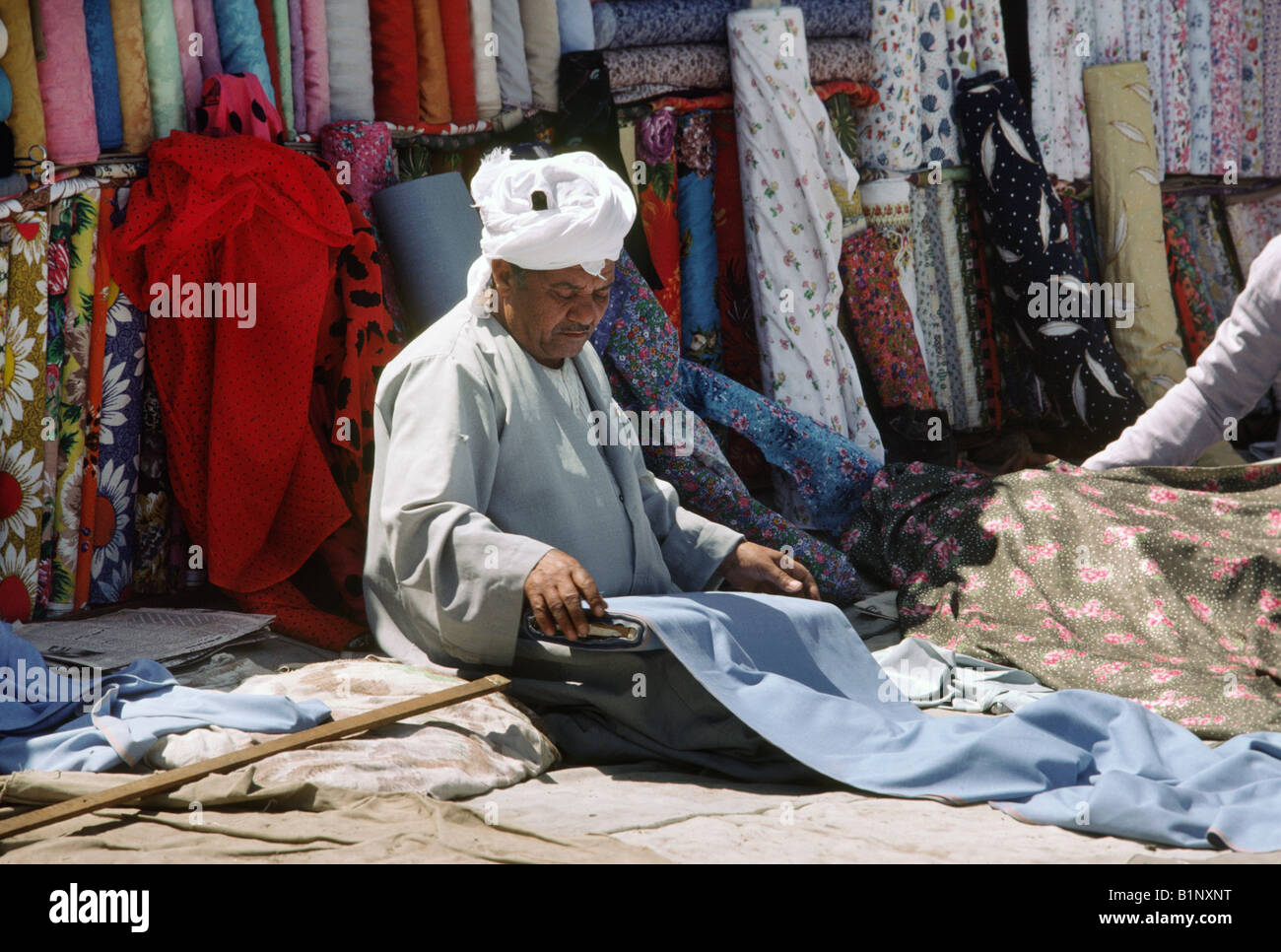 Cloth merchant, outdoor market, Cairo, Egypt Stock Photo Alamy