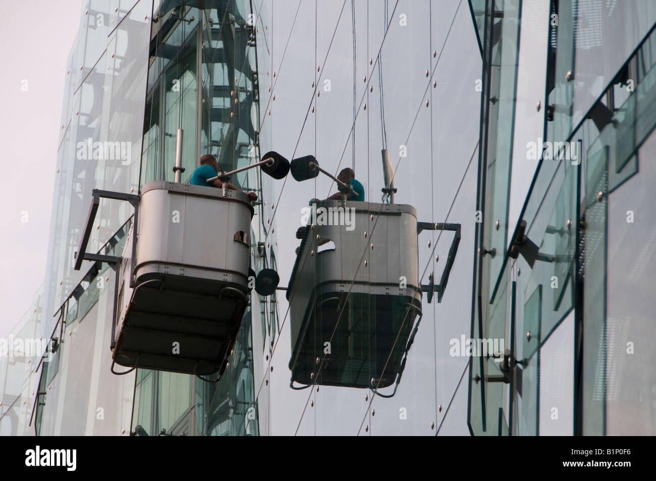 Cradle carrying cleaning workers in Berlin Germany Stock Photo