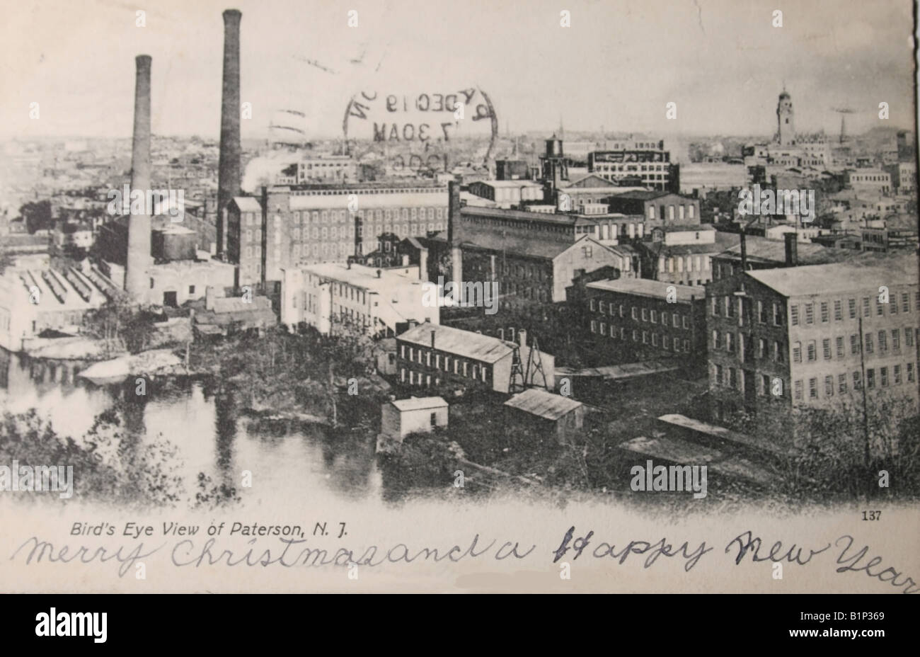 Vintage postcard of 1908 of Paterson in New Jersey with silk industry and text merry christmas happy new year Stock Photo