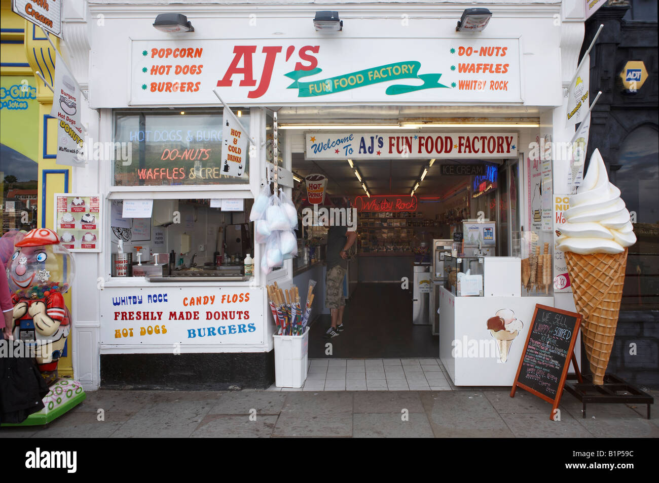 ICE CREAM SHOP ON HARBOUR SIDE WHITBY VILLAGE SUMMER NORTH YORKSHIRE