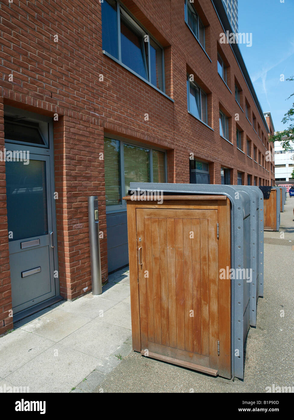Bin enclosure in Coin Street London SE1 Coin Street housing co-operatives Stock Photo