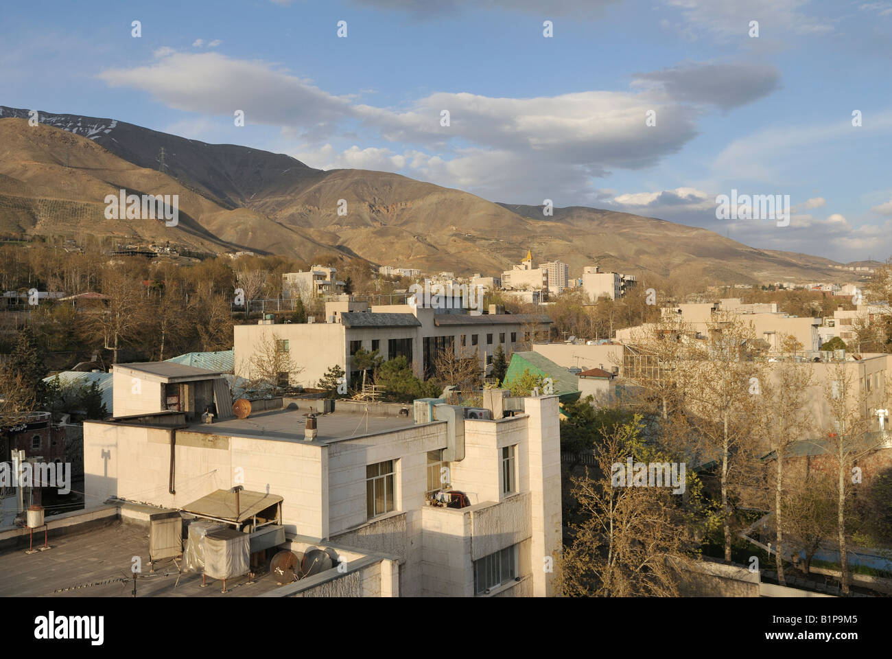 Alborz Mountain range behind the city in northern Teheran Stock Photo