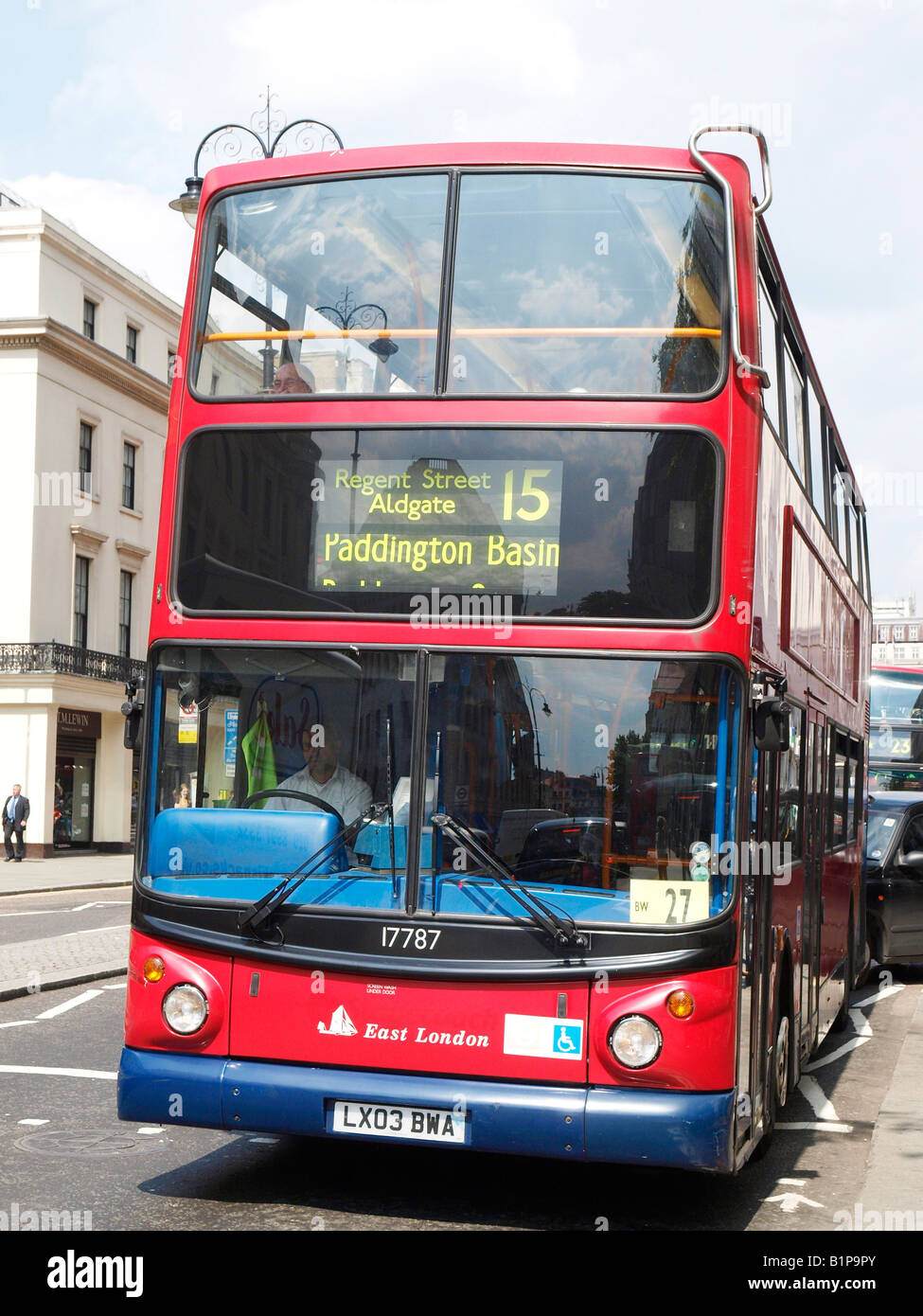 Driver only red double decker bus, The Strand, London, England Stock Photo