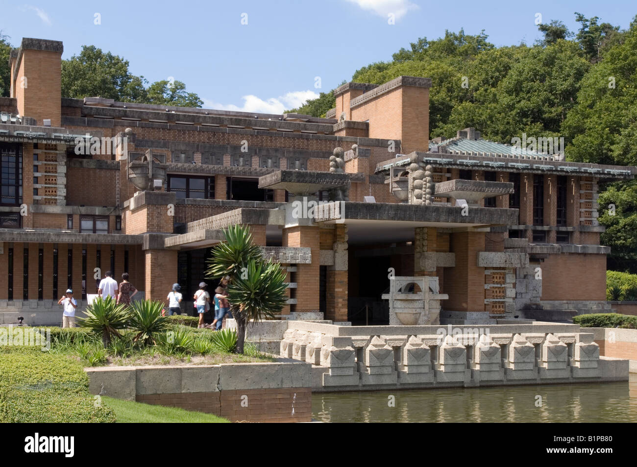 Exterior of Frank Lloyd Wright Imperial Hotel as reconstructed at Meijimura historical theme park showing front entrance portico Stock Photo