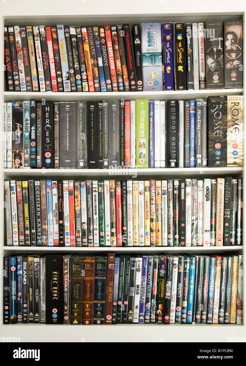 House shelves full of DVD DVDs films UK Stock Photo - Alamy