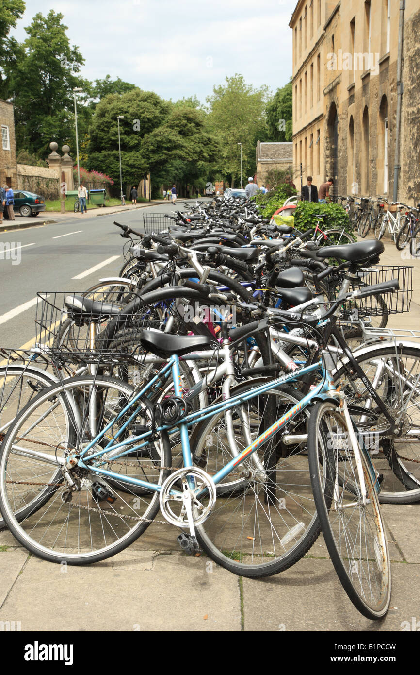 A row of parked bicycles on the the pathway in Oxford Stock Photo