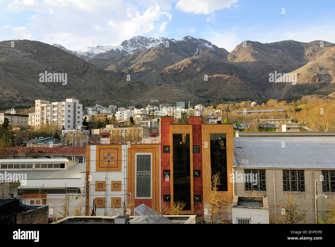 Alborzl Mountain range behind the city in northern Teheran Stock Photo