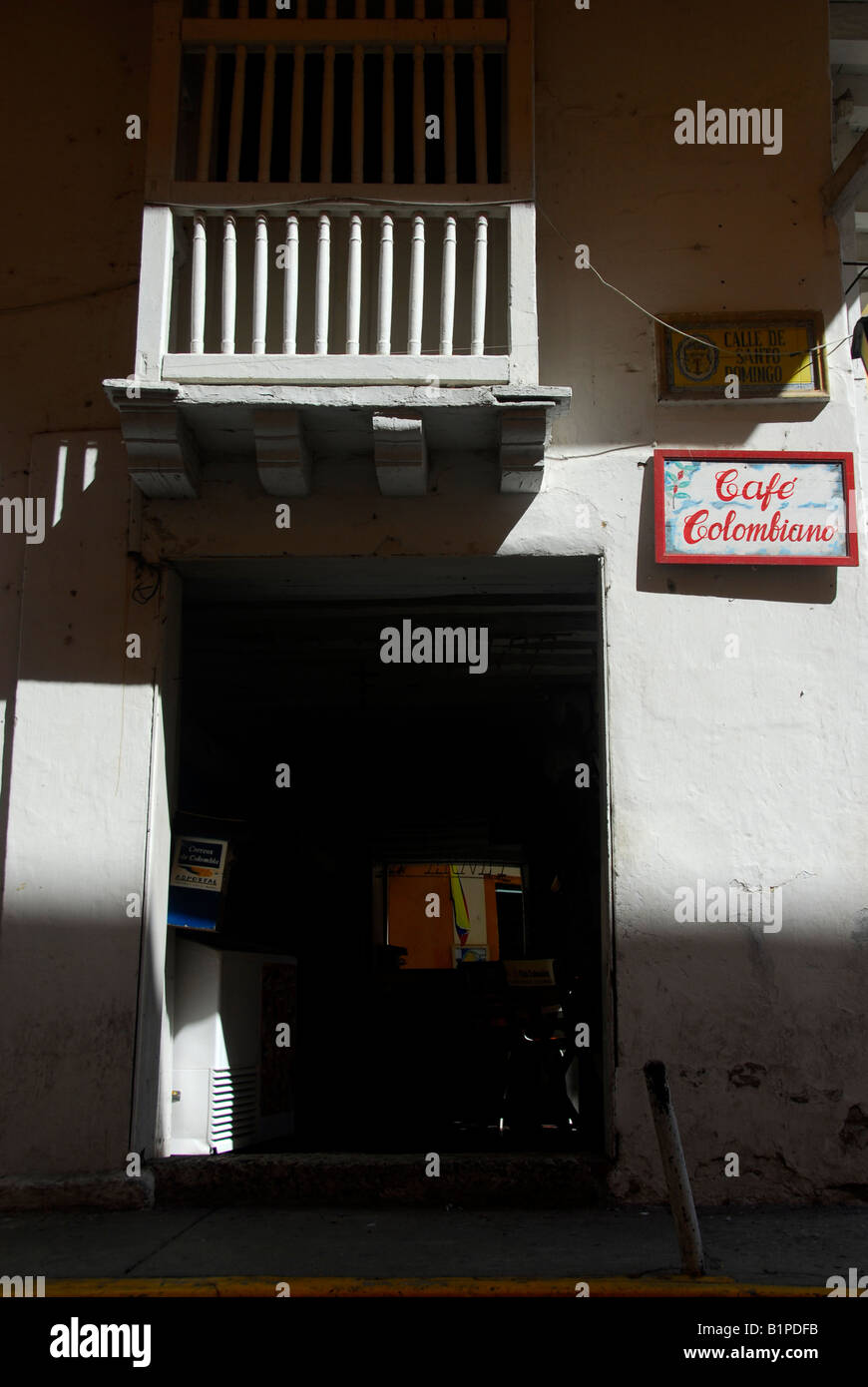 Cafe Colombiano sign on the wall of a shop on Plaza de Santo Domingo Cartagena de Indias, Colombia Stock Photo