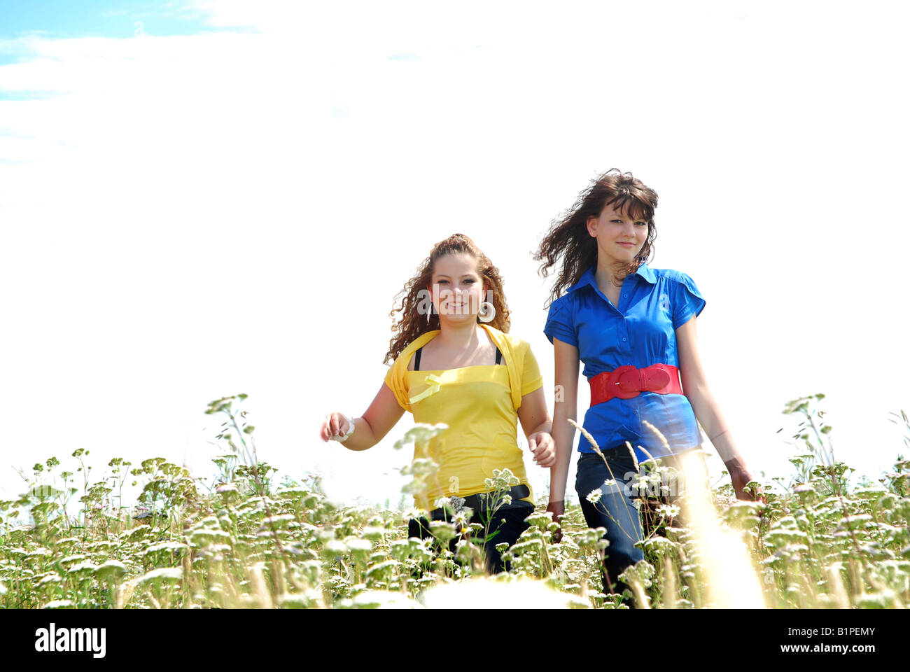 young teenage girls in field Stock Photo - Alamy