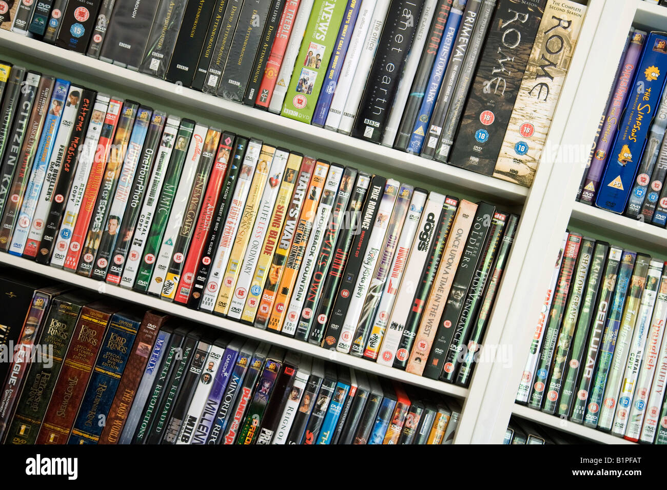 House shelves full of DVD DVDs films UK Stock Photo - Alamy