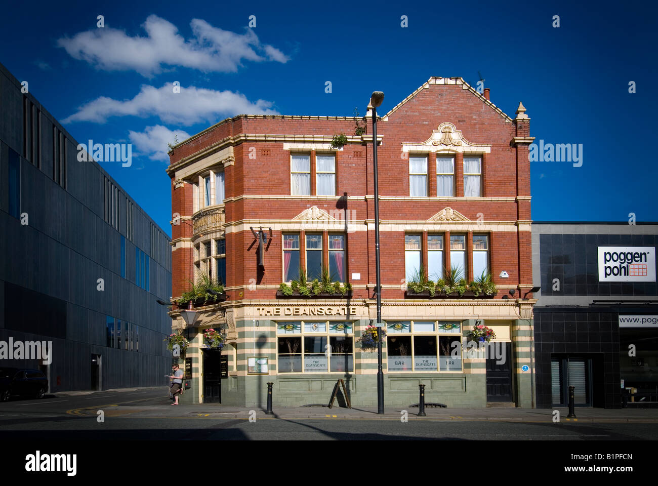 deansgate public house manchester victorian pub with blue sky Stock Photo