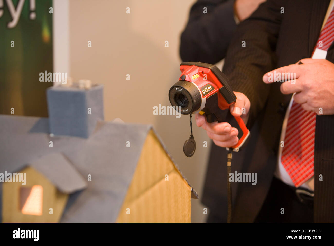 A thermal imaging camera being used to demonstrate heat loss on display