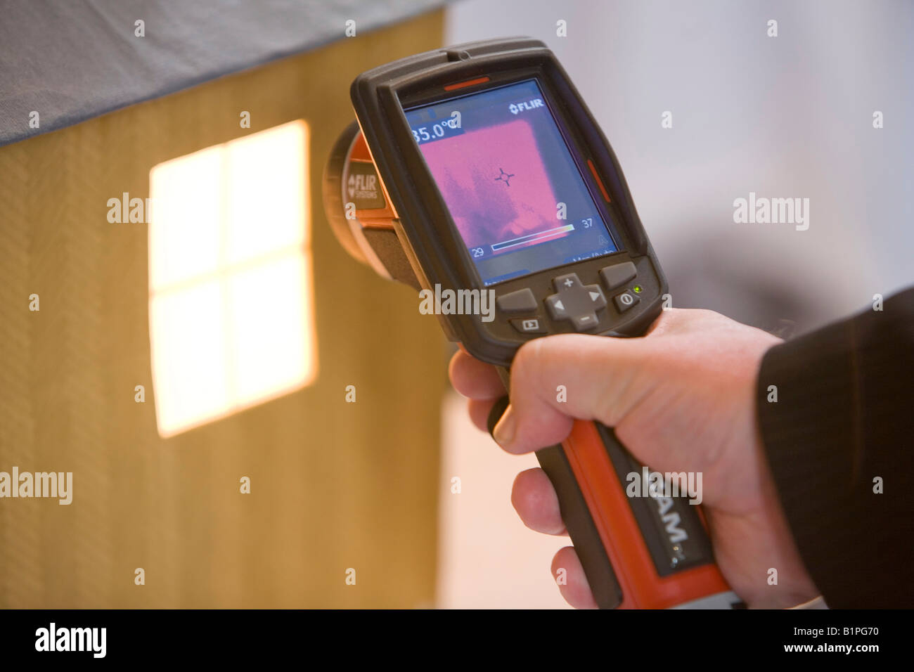 A thermal imaging camera being used to demonstrate heat loss on display
