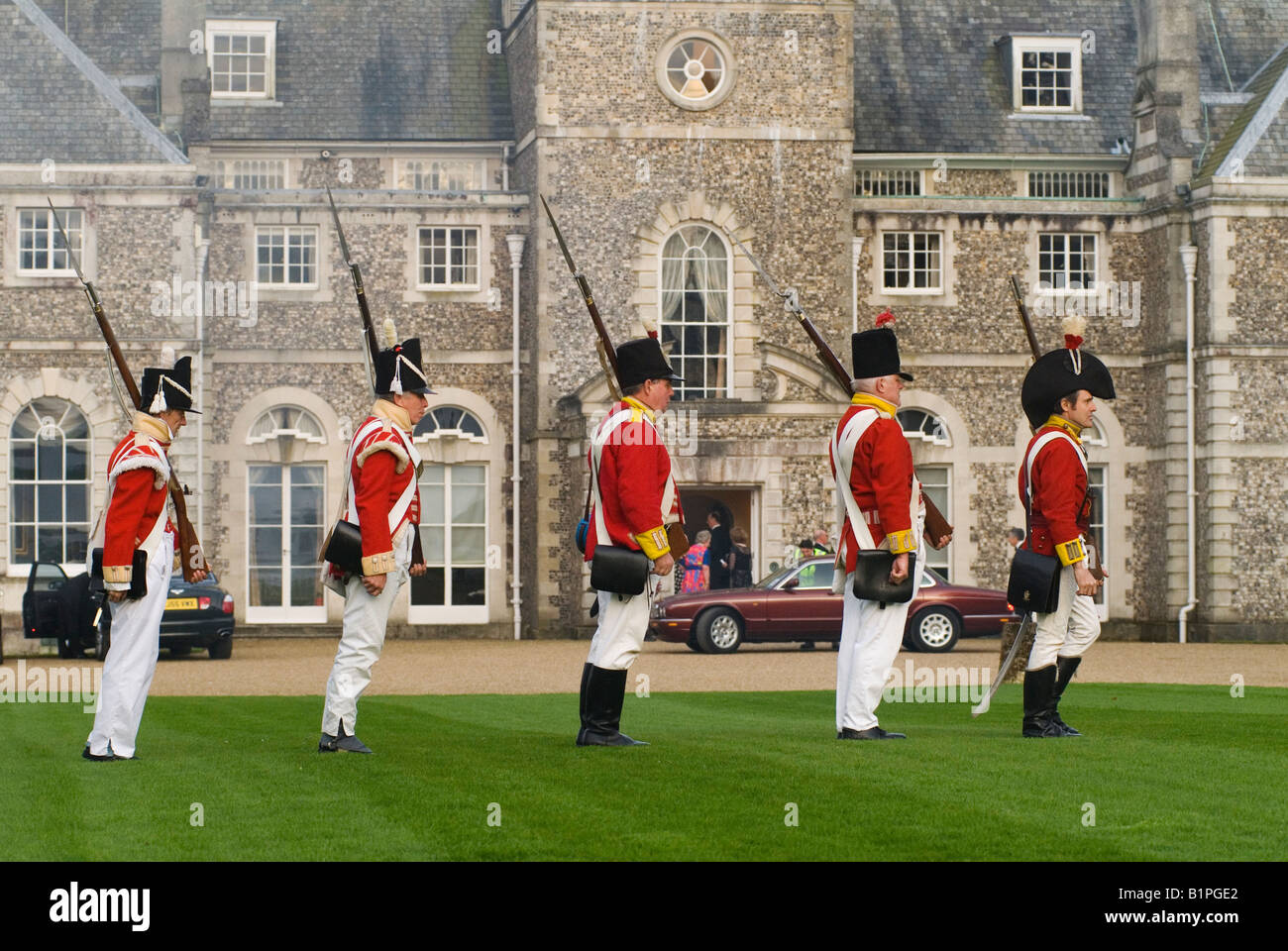 Guests arrive at private party. Re-enactment soldiers at country house. Farleigh Wallop House, Farleigh Wallop, Hampshire. UK 2000s 2008 HOMER SYKES Stock Photo