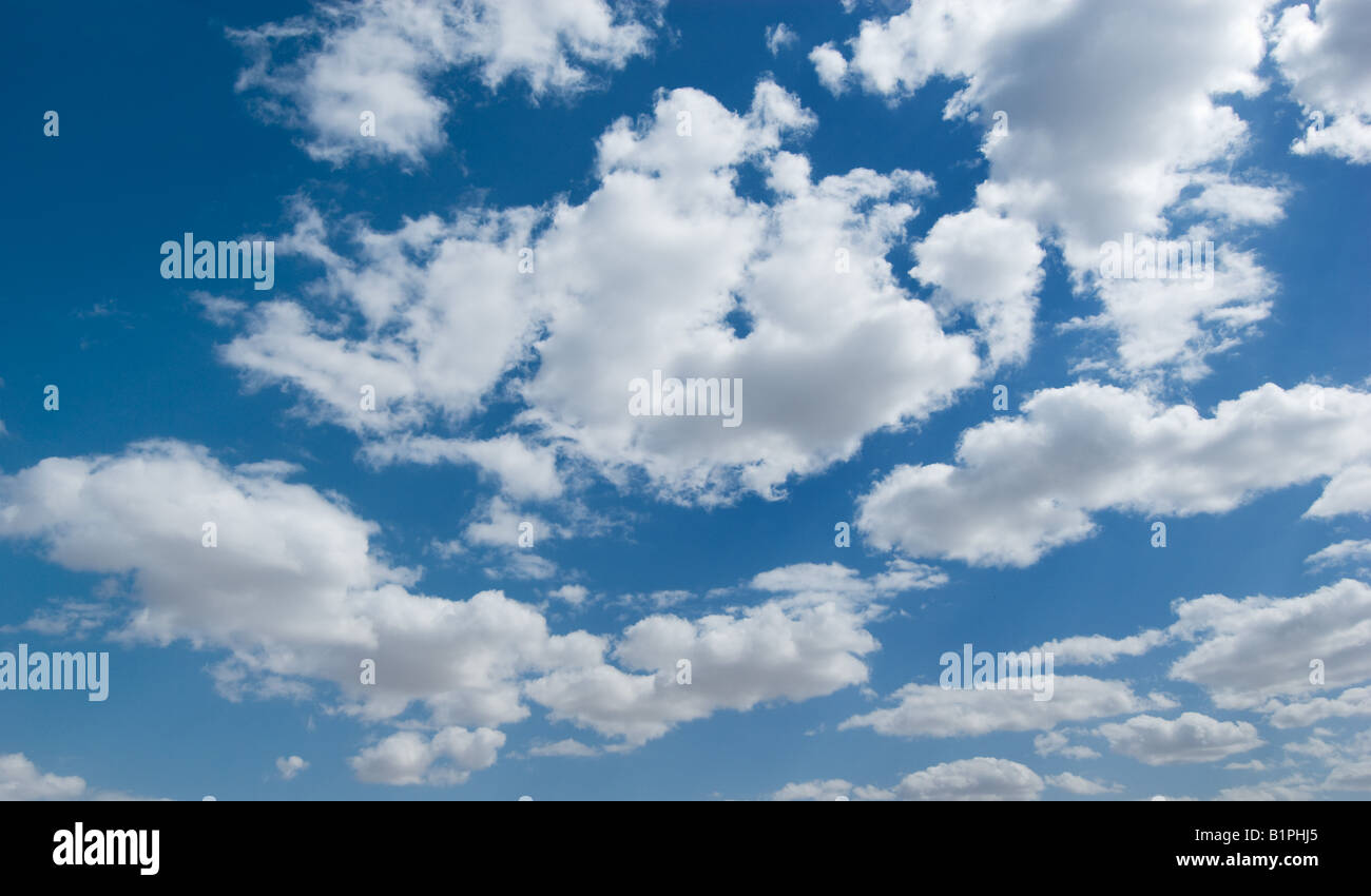 white clouds over deep blue sky background Stock Photo - Alamy
