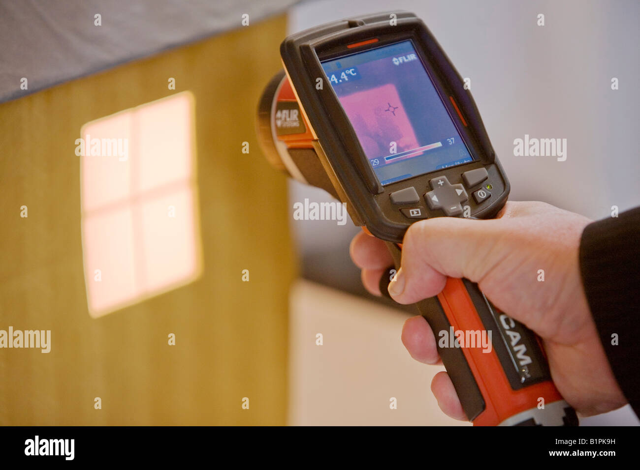 A thermal imaging camera being used to demonstrate heat loss on display